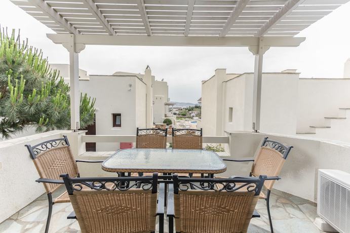 Imagen de la habitación del Hotel Iliada Villas. Foto 9