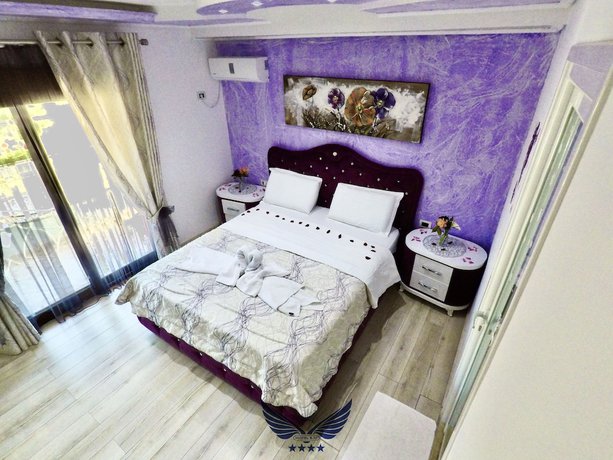 Imagen de la habitación del Hotel Ilio Boutique. Foto 11