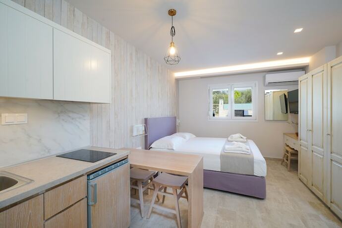 Imagen de la habitación del Hotel Iliomagic Luxury Suites Thassos. Foto 13