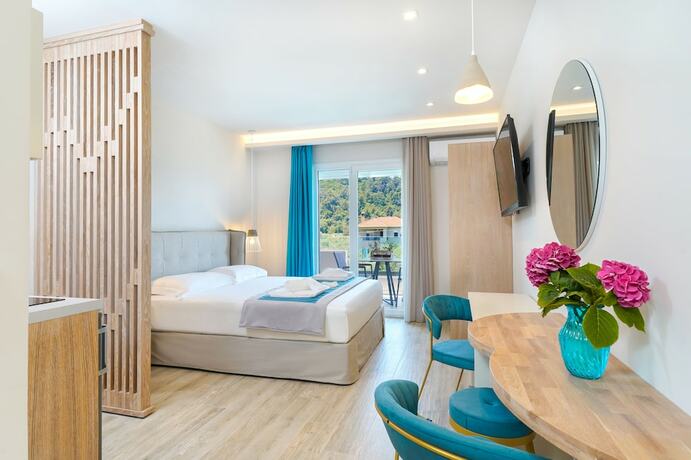 Imagen de la habitación del Hotel Iliomagic Luxury Suites Thassos. Foto 14