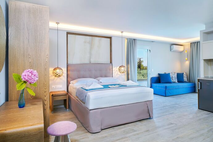 Imagen de la habitación del Hotel Iliomagic Luxury Suites Thassos. Foto 15