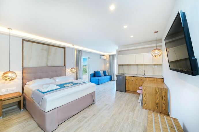Imagen de la habitación del Hotel Iliomagic Luxury Suites Thassos. Foto 17