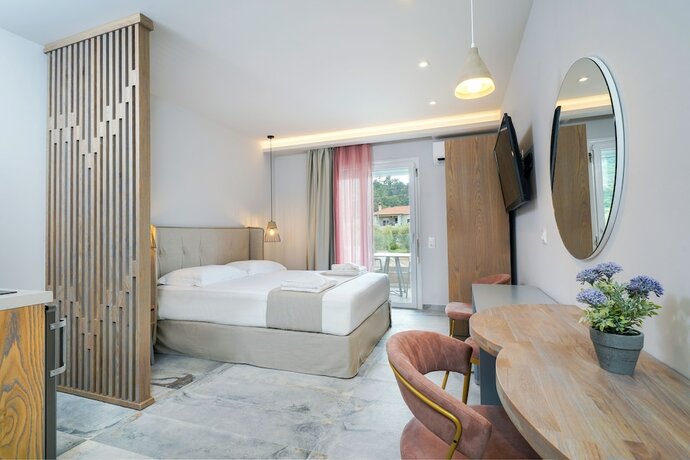 Imagen de la habitación del Hotel Iliomagic Luxury Suites Thassos. Foto 18