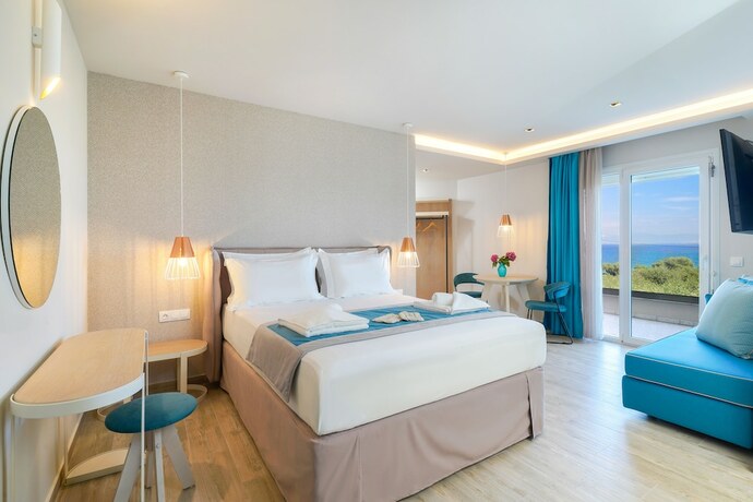 Imagen de la habitación del Hotel Iliomagic Luxury Suites Thassos. Foto 19