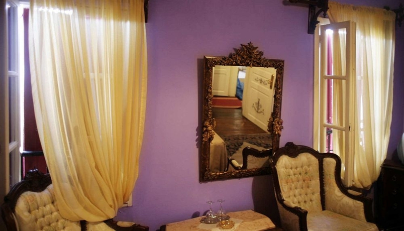 Imagen de la habitación del Hotel Ilion Suites. Foto 8