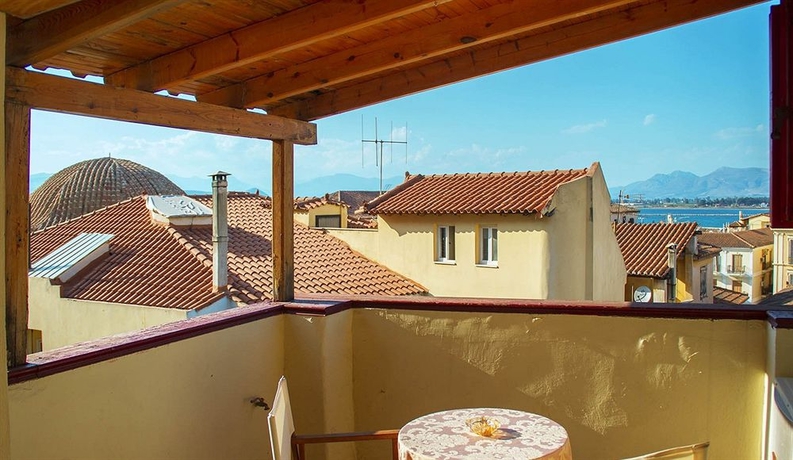 Imagen de la habitación del Hotel Ilion Suites. Foto 9