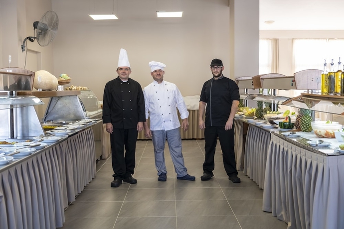 Imagen del bar/restaurante del Hotel Ilios K Village Resort. Foto 5