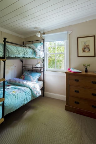 Imagen de la habitación del Hotel Illalangi Boutique Cottage. Foto 5