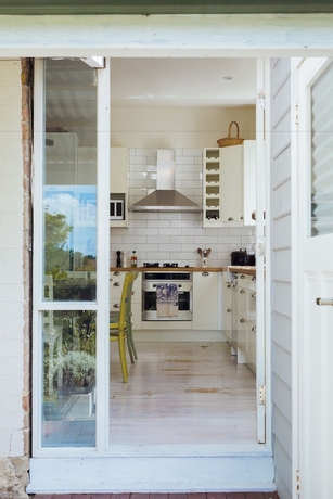 Imagen de la habitación del Hotel Illalangi Boutique Cottage. Foto 9