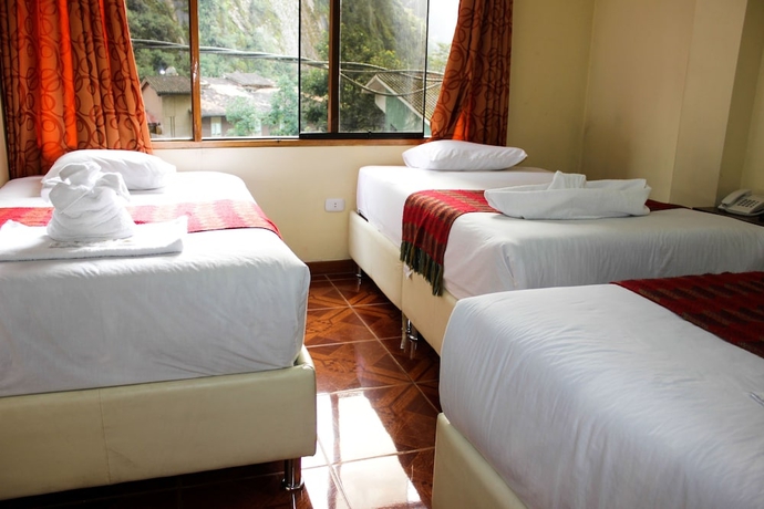 Imagen de la habitación del Hotel Illary Inn. Foto 8