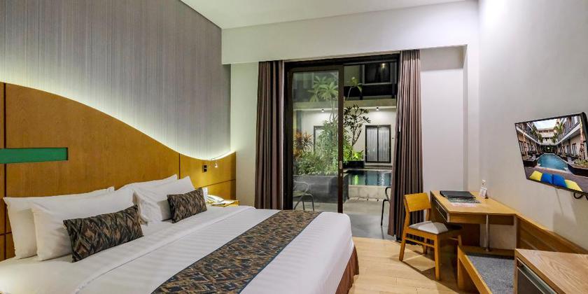 Imagen de la habitación del Hotel Illira Lite Praya Lombok. Foto 20