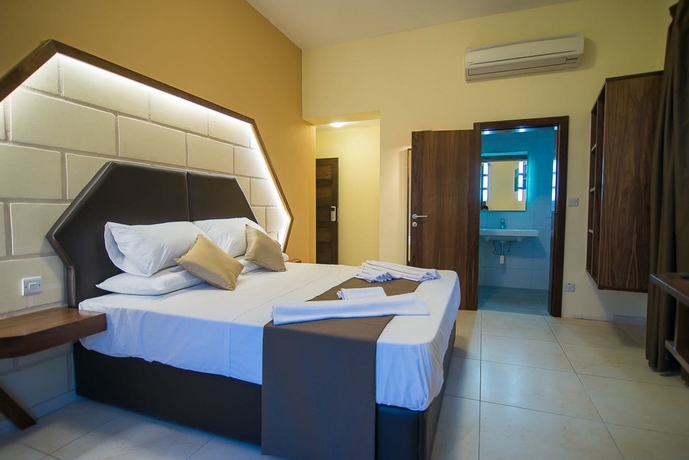 Imagen de la habitación del Hotel Il-logga Boutique. Foto 4