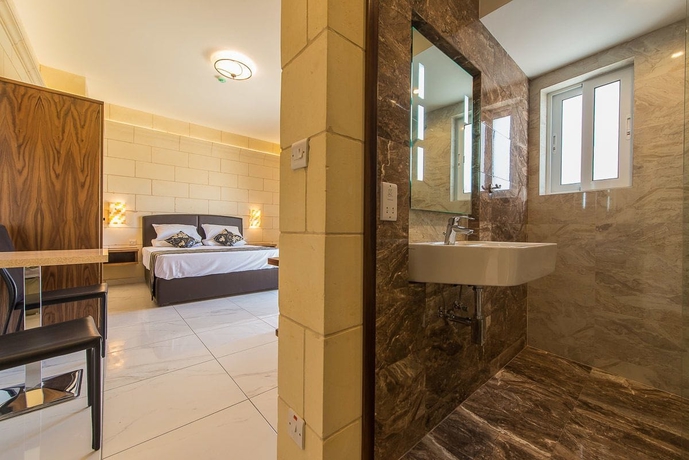 Imagen de la habitación del Hotel Il-logga Boutique. Foto 5