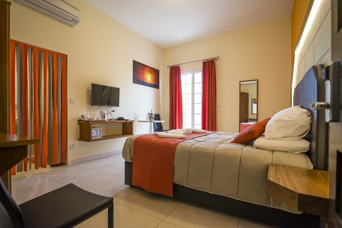 Imagen de la habitación del Hotel Il-logga Boutique. Foto 6