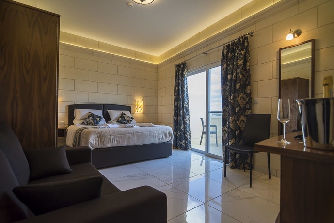 Imagen de la habitación del Hotel Il-logga Boutique. Foto 7