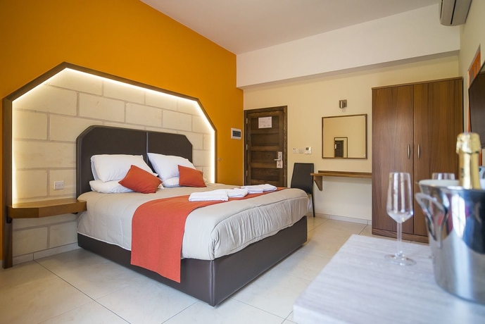 Imagen de la habitación del Hotel Il-logga Boutique. Foto 8