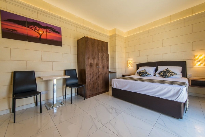 Imagen de la habitación del Hotel Il-logga Boutique. Foto 9