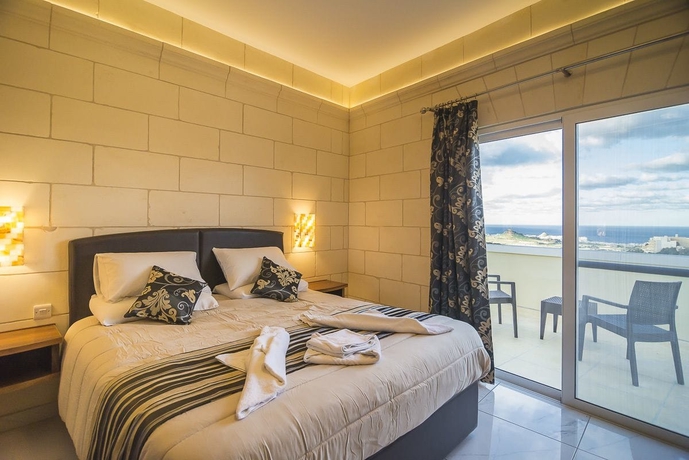 Imagen de la habitación del Hotel Il-logga Boutique. Foto 11