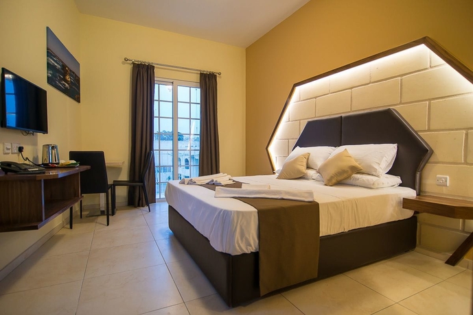 Imagen de la habitación del Hotel Il-logga Boutique. Foto 12