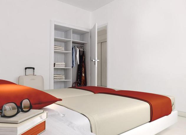 Imagen de la habitación del Hotel Illot Suites. Foto 10