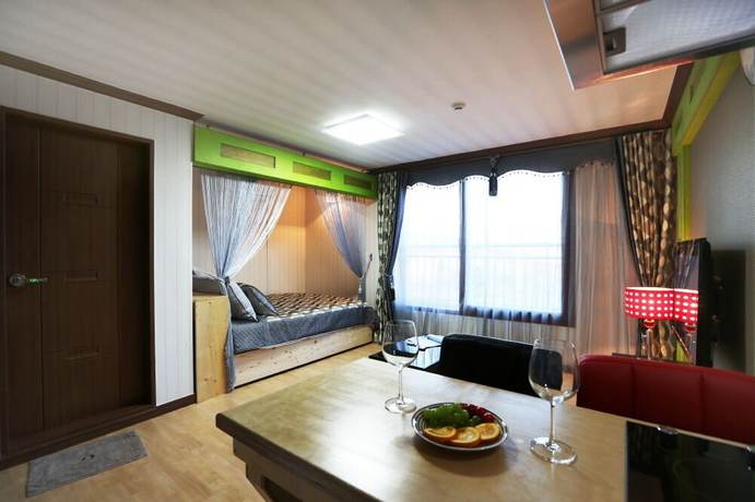 Imagen de la habitación del Hotel Illua Pension. Foto 2