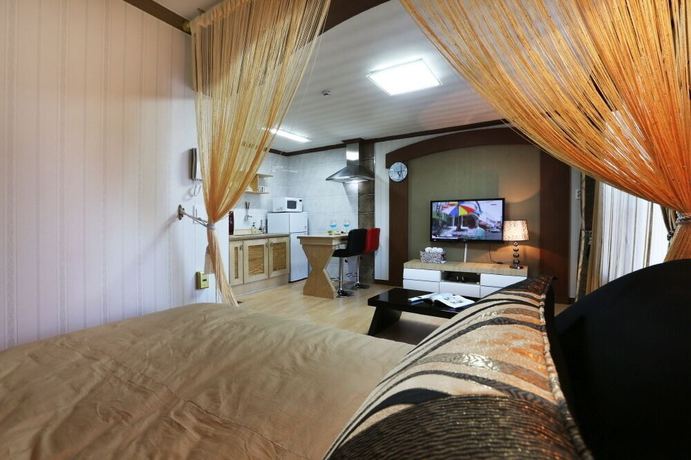 Imagen de la habitación del Hotel Illua Pension. Foto 10