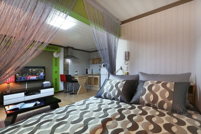 Imagen de la habitación del Hotel Illua Pension. Foto 18
