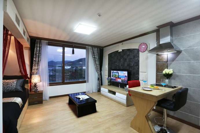 Imagen de la habitación del Hotel Illua Pension. Foto 19