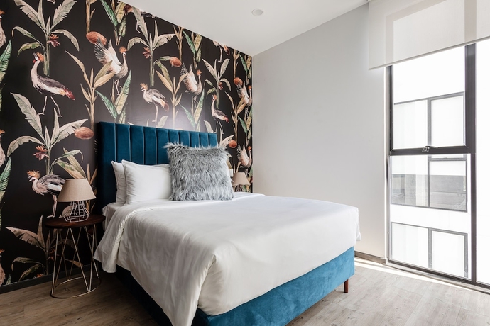 Imagen de la habitación del Hotel Illum&eacute; Urban Living - Apartments in the heart of Roma Norte. Foto 10
