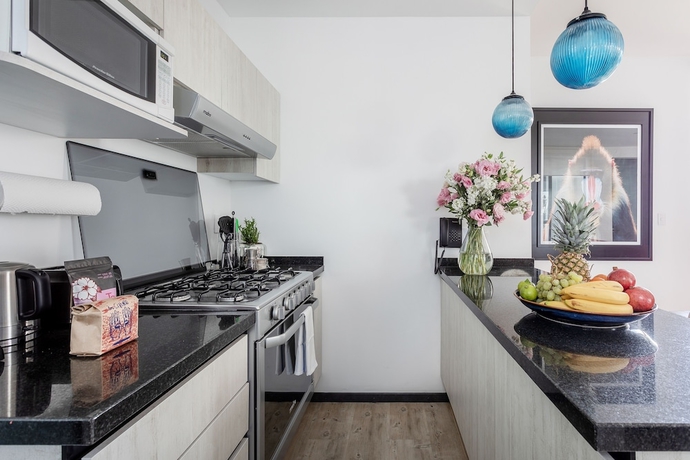 Imagen de la habitación del Hotel Illum&eacute; Urban Living - Apartments in the heart of Roma Norte. Foto 13