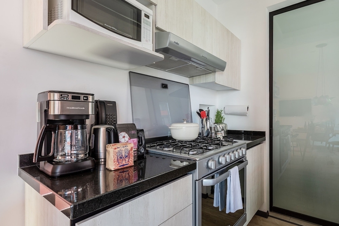 Imagen de la habitación del Hotel Illum&eacute; Urban Living - Apartments in the heart of Roma Norte. Foto 14