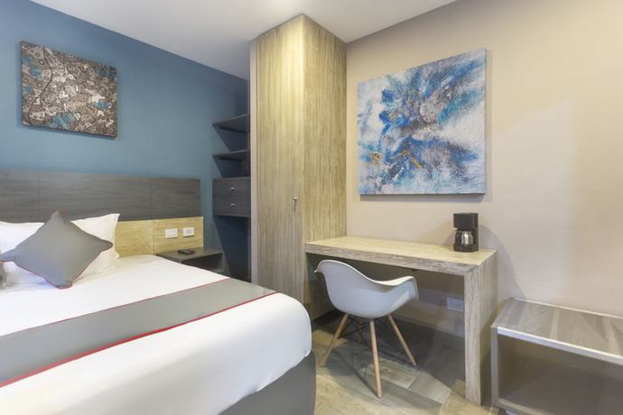 Imagen de la habitación del Hotel Illusion Xpress. Foto 4