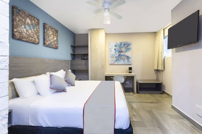 Imagen de la habitación del Hotel Illusion Xpress. Foto 5