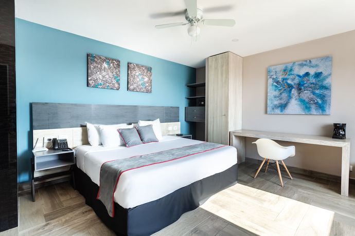 Imagen de la habitación del Hotel Illusion Xpress. Foto 6