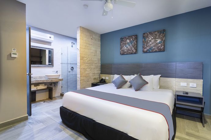 Imagen de la habitación del Hotel Illusion Xpress. Foto 8