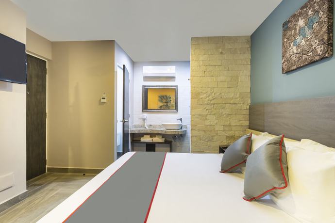 Imagen de la habitación del Hotel Illusion Xpress. Foto 10