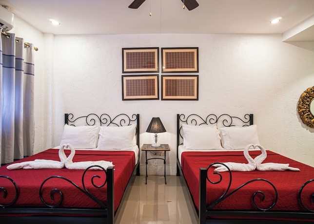 Imagen de la habitación del Hotel Ilocos Urban Wave Resort. Foto 8