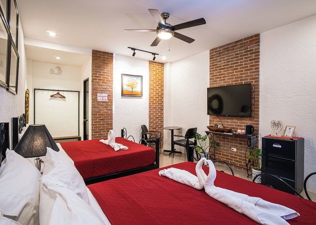 Imagen de la habitación del Hotel Ilocos Urban Wave Resort. Foto 9