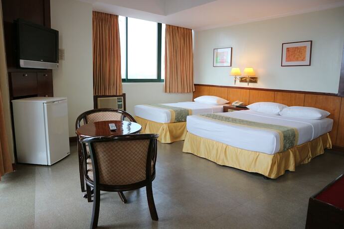 Imagen de la habitación del Hotel Iloilo Business. Foto 7