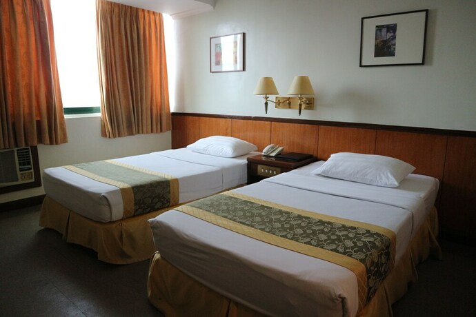 Imagen de la habitación del Hotel Iloilo Business. Foto 9