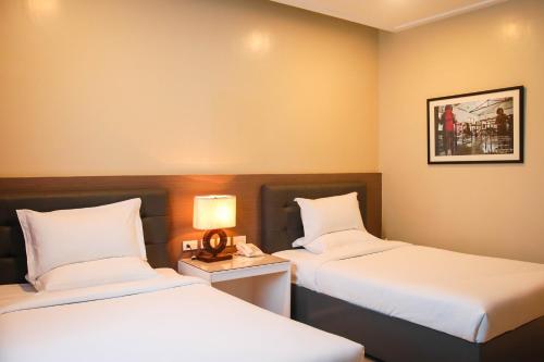 Imagen de la habitación del Hotel Iloilo Gateway and Suites. Foto 5