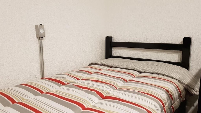 Imagen de la habitación del Hotel Imagina Hostel. Foto 11