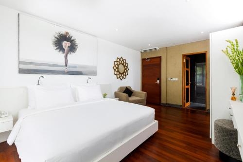 Imagen de la habitación del Hotel Imani Suites. Foto 6