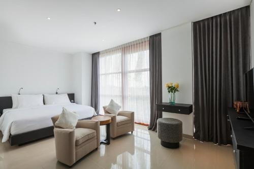 Imagen de la habitación del Hotel Imani Suites. Foto 8