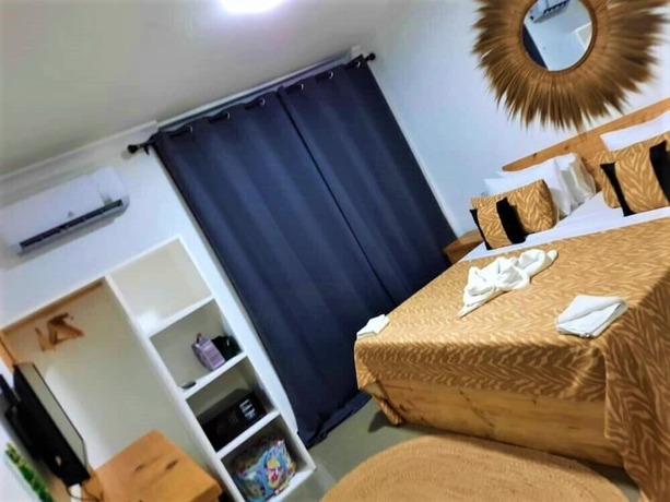 Imagen de la habitación del Hotel Imara Boutique. Foto 13
