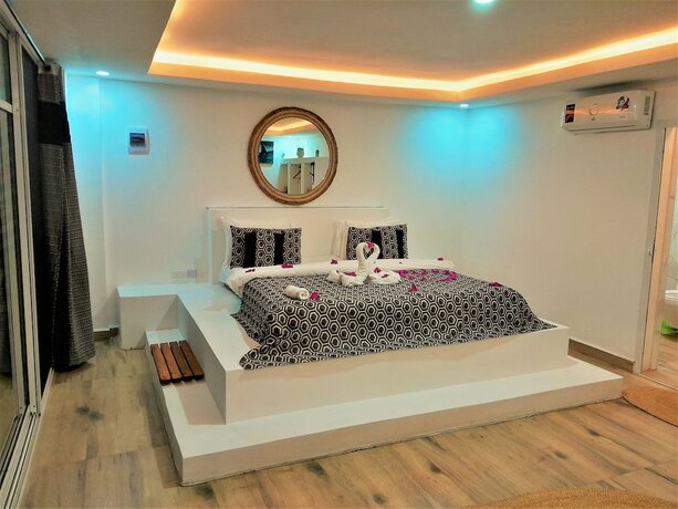 Imagen de la habitación del Hotel Imara Boutique. Foto 15