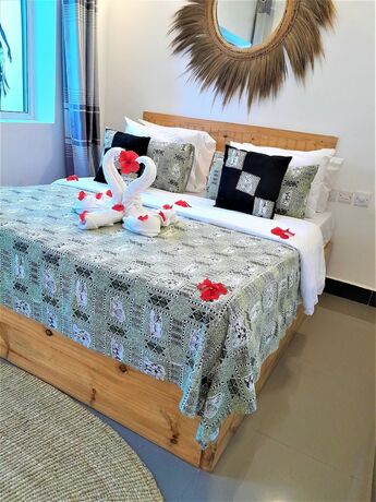 Imagen de la habitación del Hotel Imara Boutique. Foto 19