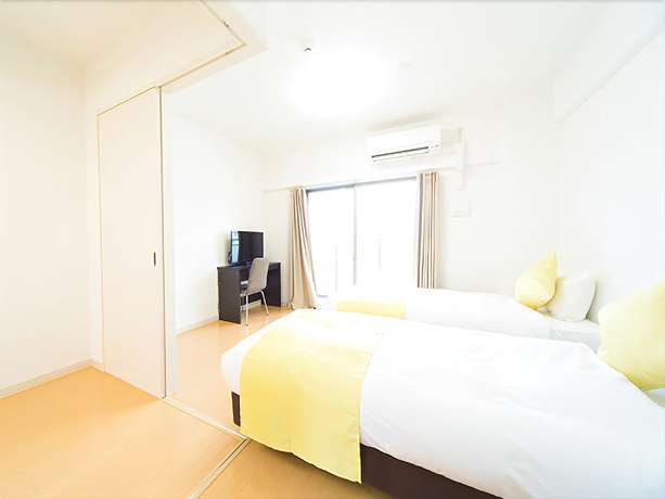 Imagen de la habitación del Hotel Imazato Crystal Hotel. Foto 15