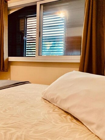 Imagen de la habitación del Hotel Imigrantes. Foto 14