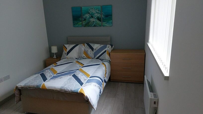 Imagen general del Hotel Immaculate 12-bed House Good Amenities in Wigan. Foto 12